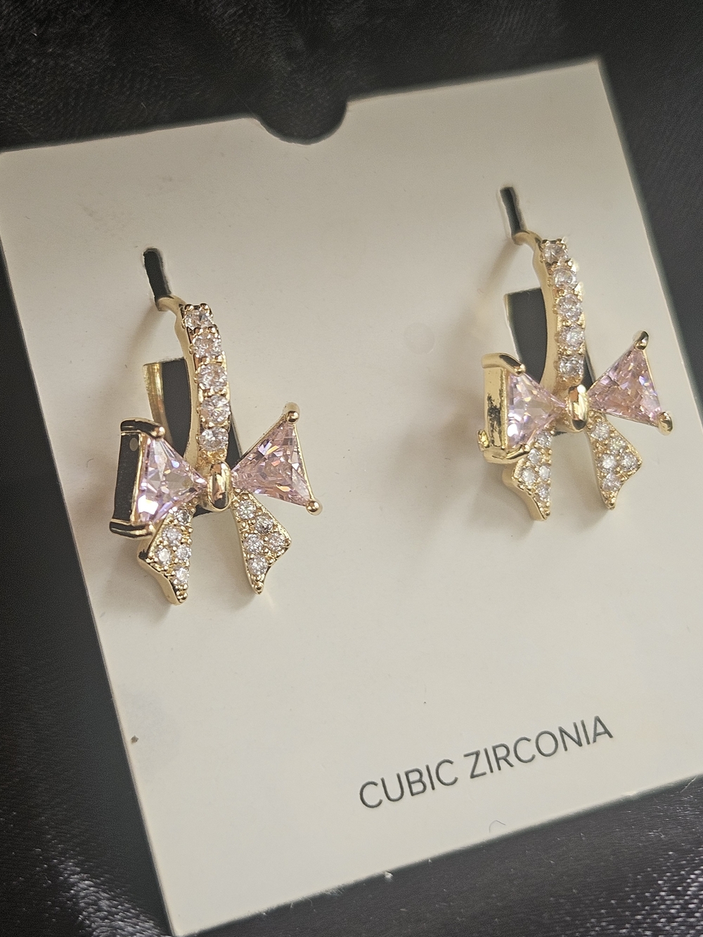 Gold Bow Earrings with Pink Cubic Zirconia Accents